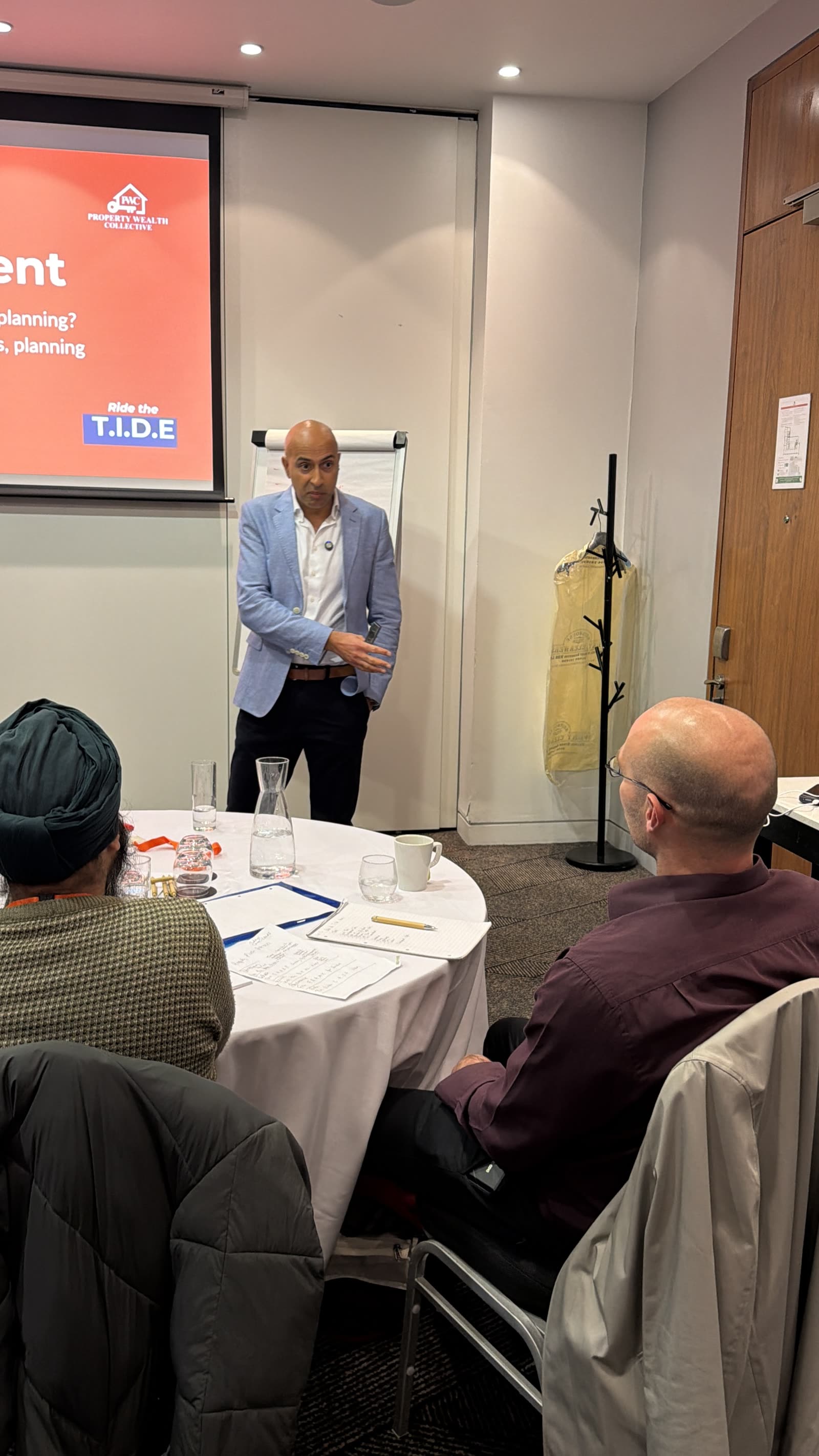 Javi Khanijau speaking at a Property Wealth Collective event
