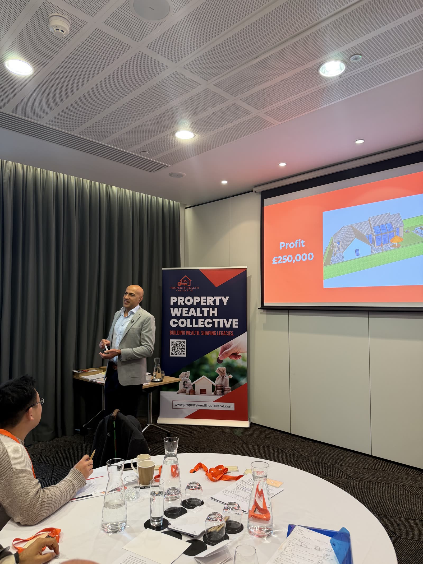Javi Khanijau speaking at a Property Wealth Collective event